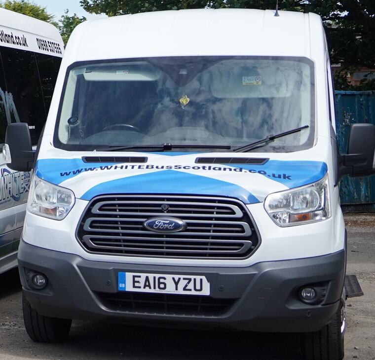 A White Bus Scotland Ford Transit minibus